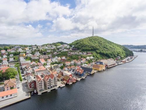 an aerial view of a town next to a river at Grand Hotel Egersund in Egersund