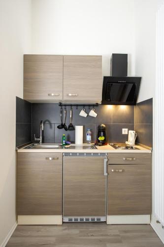 Kuchyň nebo kuchyňský kout v ubytování Appartment Stadtgarten