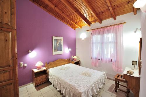 Säng eller sängar i ett rum på Anastazia Paradise