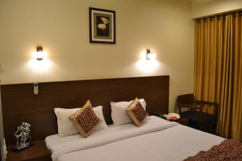 Ліжко або ліжка в номері Hotel Adi