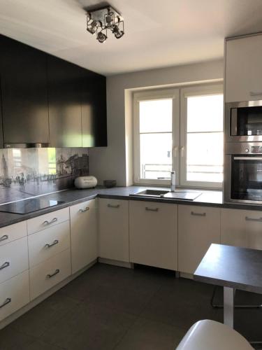 Kuchyň nebo kuchyňský kout v ubytování Apartament Kraków