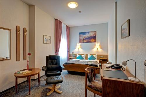 Posezení v ubytování Paulin Hotel Trier
