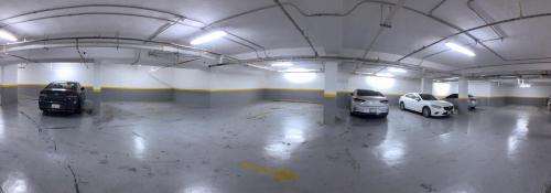 a group of cars parked in a parking garage at لافنت بارك للشقق المخدومة - إقتصادي in Jeddah