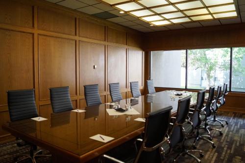 a conference room with a long table and chairs at Radisson Hotel & Conference Centre Edmonton in Edmonton