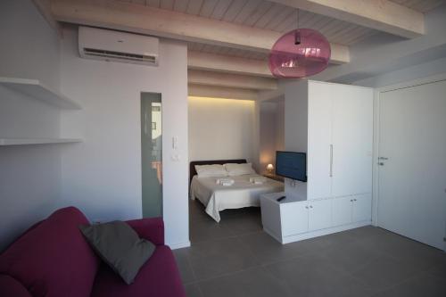 Ένα ή περισσότερα κρεβάτια σε δωμάτιο στο The Sea Rooms