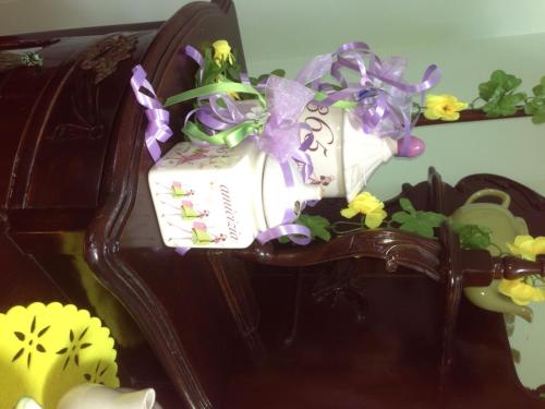 a toy chair with a wedding dress on it at Magnolia House in Taurianova