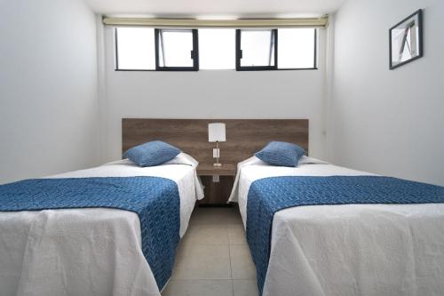 Cama o camas de una habitación en JUUB Oaxaca Experience (R4)