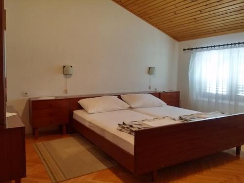 Posteľ alebo postele v izbe v ubytovaní Apartments Katarina