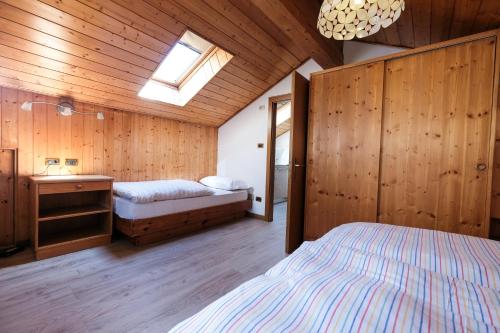 Cama o camas de una habitación en Appartamenti Bel Sit