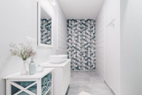 Ванна кімната в Wiigi Apartments