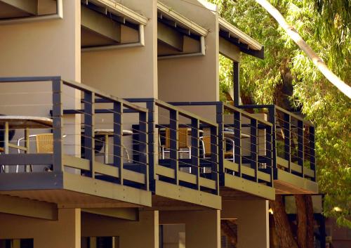 a building with a blue and white deck at Margarets Forest in Margaret River Town