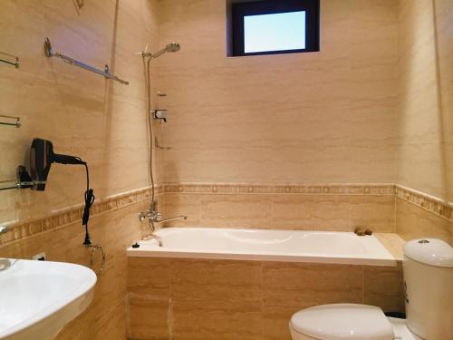 Ένα μπάνιο στο Mavie Guest House