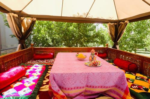 Κήπος έξω από το Mavie Guest House