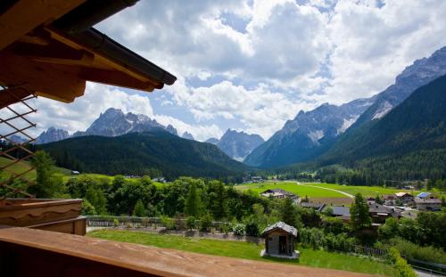 a view of a valley with mountains in the background at Apartments Sunseit'n in Sesto