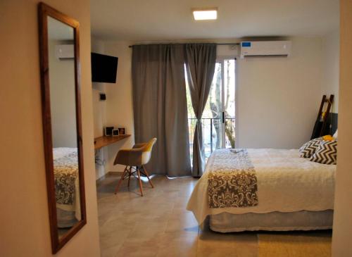 Tempat tidur dalam kamar di El Balconcito Monoambiente