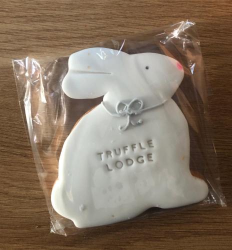 a cookie shaped like a white mouse in a plastic bag at Truffle Lodge in Lindfield