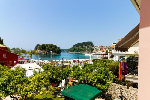 a view of a beach and a body of water at ANEMOS in Parga