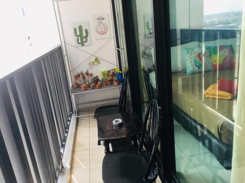 a balcony with a toilet in a room at Studio I-Soho D'Gunduls Homestay by DGH I-CITY in Shah Alam