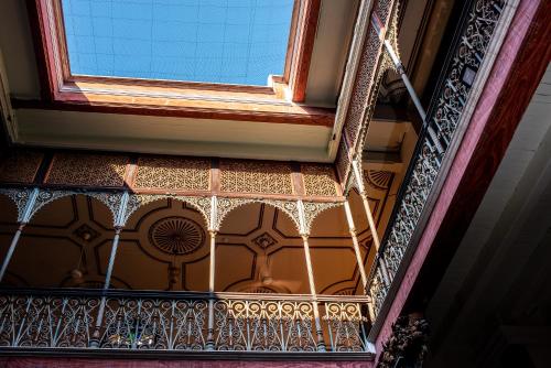 an overhead view of a balcony with a window at Cheong Fatt Tze - The Blue Mansion in George Town