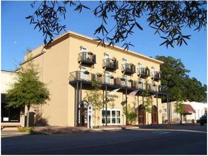 a large building with balconies on the side of it at Hampton Inn Fairhope-Mobile Bay, AL in Fairhope