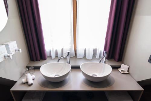 Ένα μπάνιο στο Boutique Hotel The Roosevelt