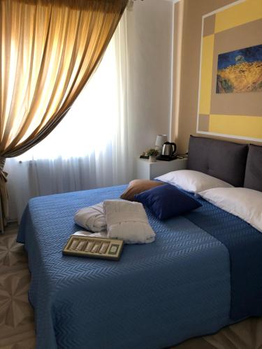 Ένα ή περισσότερα κρεβάτια σε δωμάτιο στο Agriturismo Casa Giusta