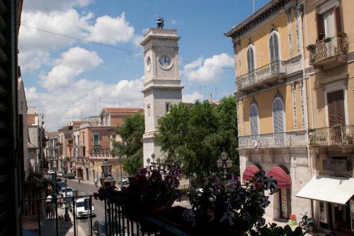 a clock tower in the middle of a city at Bed & Breakfast Casa Lopez in Barletta