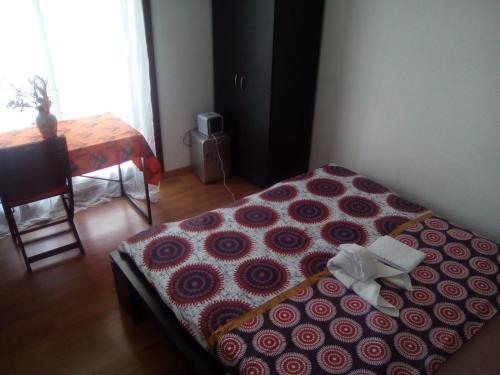 Una cama o camas en una habitación de Sombang