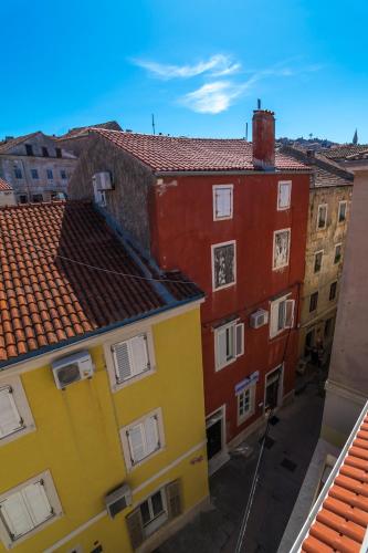 an overhead view of buildings in a city at Apartments and Rooms Jospino in Mali Lošinj