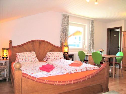 Postel nebo postele na pokoji v ubytování Gästehaus Horizont