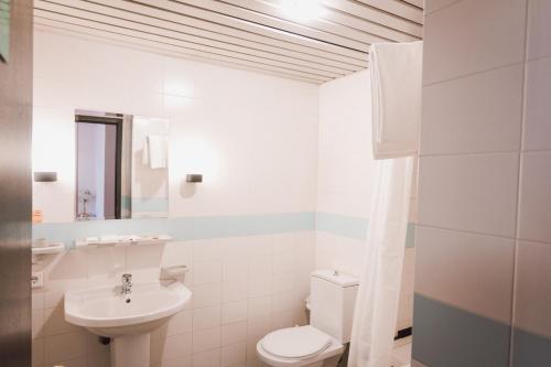 Koupelna v ubytování AMAKS Safar Hotel