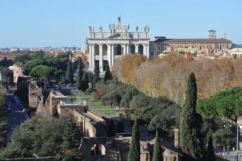 a view of the palace of versailles from the city at Domus Sessoriana in Rome