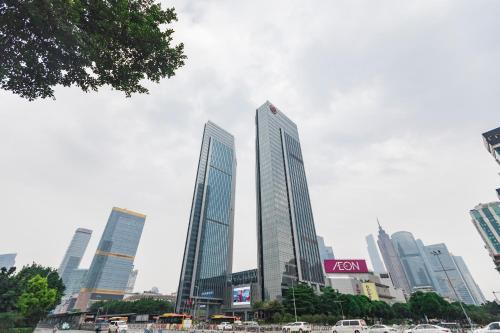 a group of tall buildings in a city at Springdale Serviced Residence Guangzhou in Guangzhou