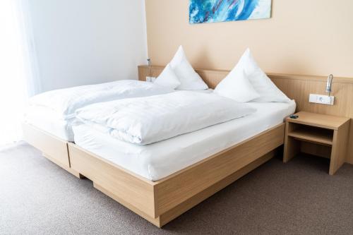 Katil atau katil-katil dalam bilik di Hotel Rieder
