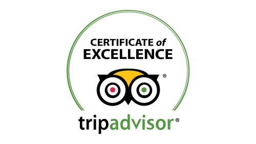 a circle with the text certificate of excellence and an owl face at City Park Hotel & Residence in Poznań