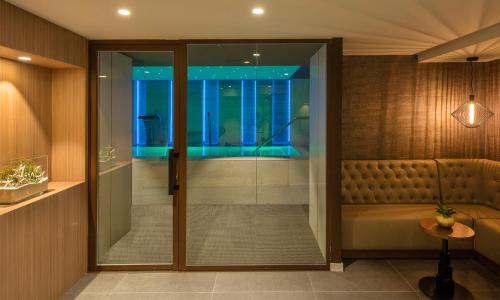 a walk in shower in a hotel room at Golden Costa Salou - Adults Only 4* Sup in Salou