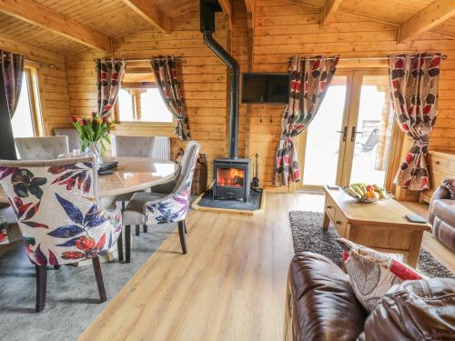 Zona de estar de Manor Farm Lodges - Red Kite Lodge