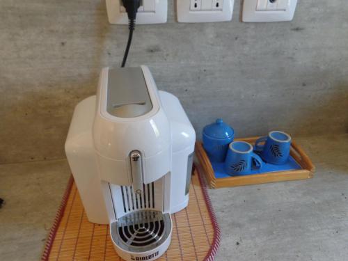 Příslušenství pro přípravu čaje a kávy v ubytování lidoapartment