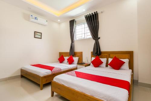 Ένα ή περισσότερα κρεβάτια σε δωμάτιο στο Marine Hotel & Apartment