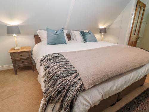 En eller flere senge i et værelse på Fenwick Retreat at Fenwick Lodge