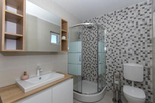 Kylpyhuone majoituspaikassa Vila Dalmatian Child