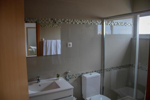 Ванна кімната в Apartamentos DECOR