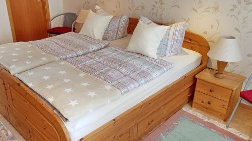 Postel nebo postele na pokoji v ubytování Ferienzimmer *Auszeit*