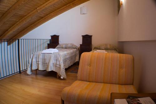 En eller flere senge i et værelse på Agriturismo La Cà Veja