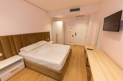 TV a/nebo společenská místnost v ubytování Hotel Alion