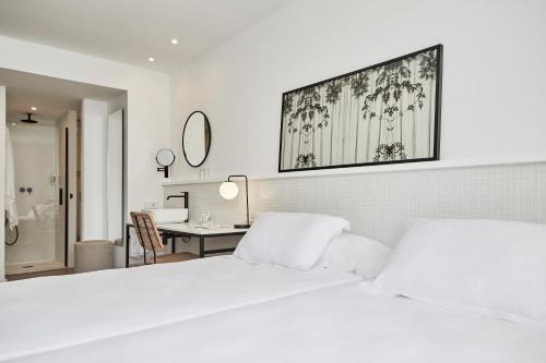 A bed or beds in a room at HM Dunas Blancas