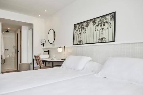 Llit o llits en una habitació de HM Dunas Blancas