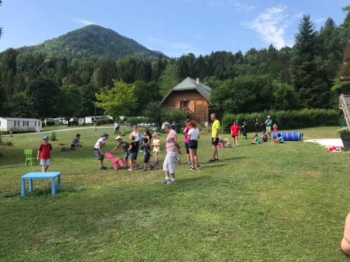 a group of people playing a game in a field at Eau Vive in Lescheraines