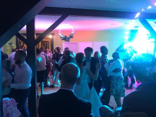 a group of people dancing at a party at Eau Vive in Lescheraines