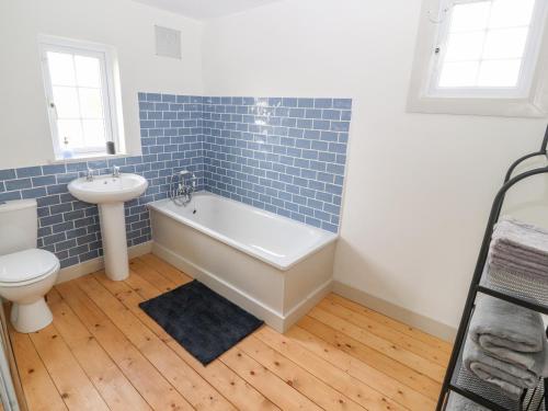 Ένα μπάνιο στο Well House Farm Flat 2